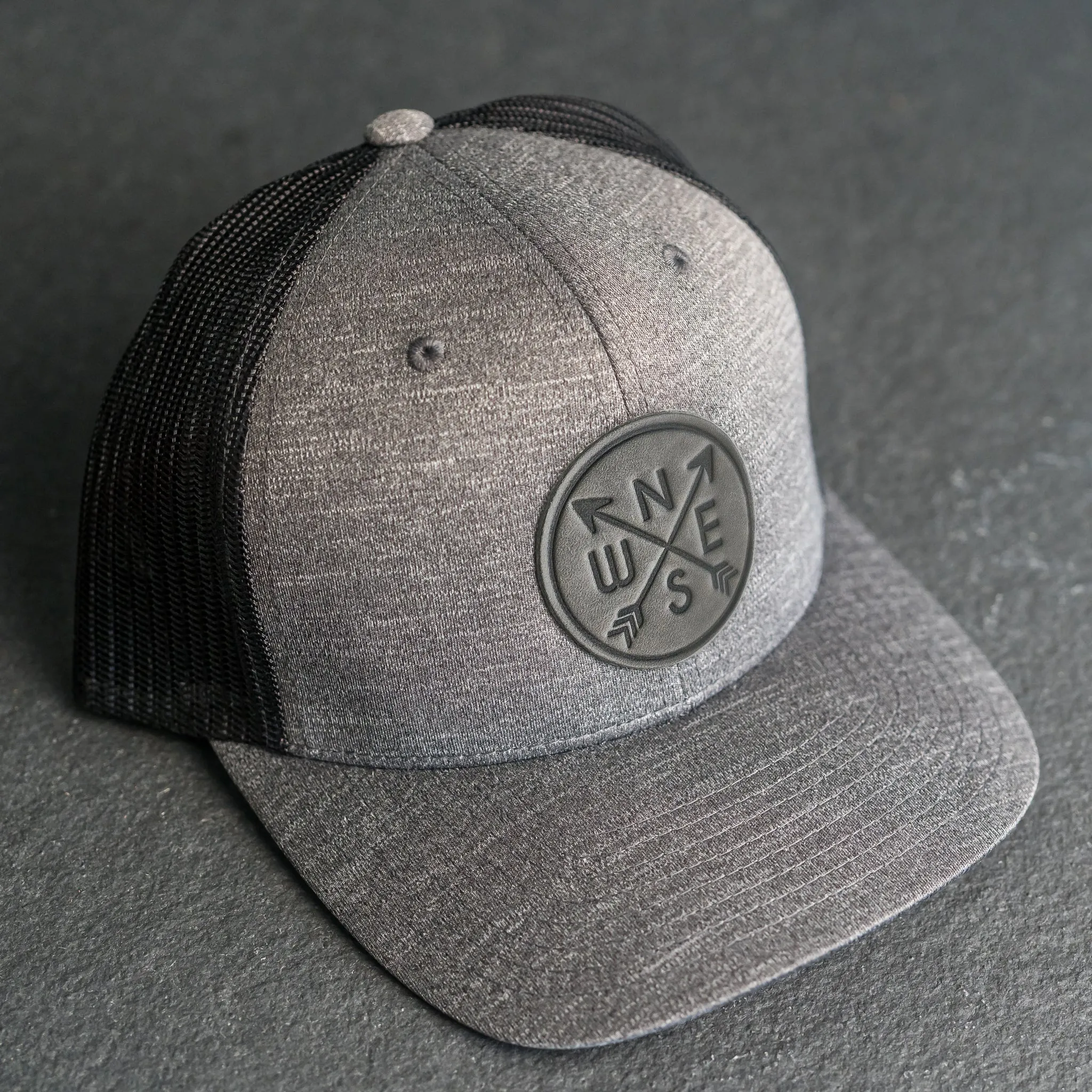 Leather Patch Performance Style Trucker Hat - Compass Rose Stamp