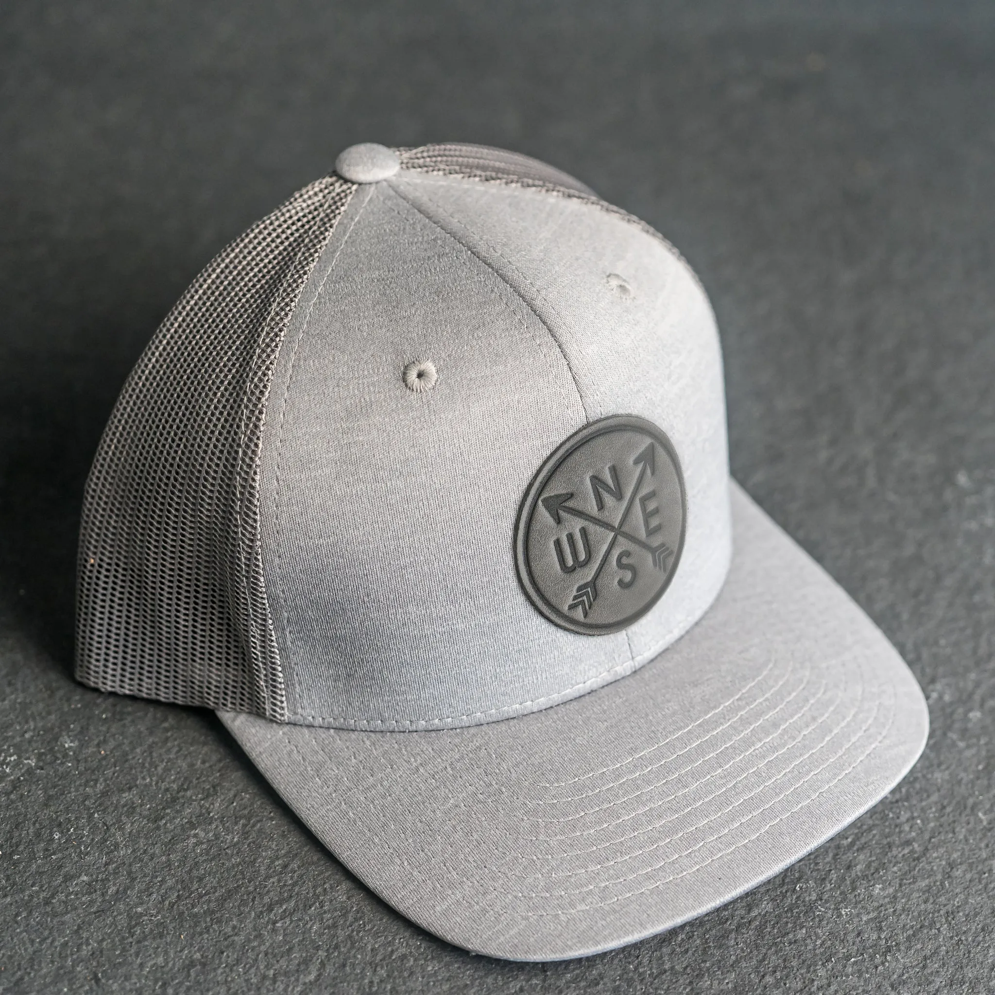 Leather Patch Performance Style Trucker Hat - Compass Rose Stamp