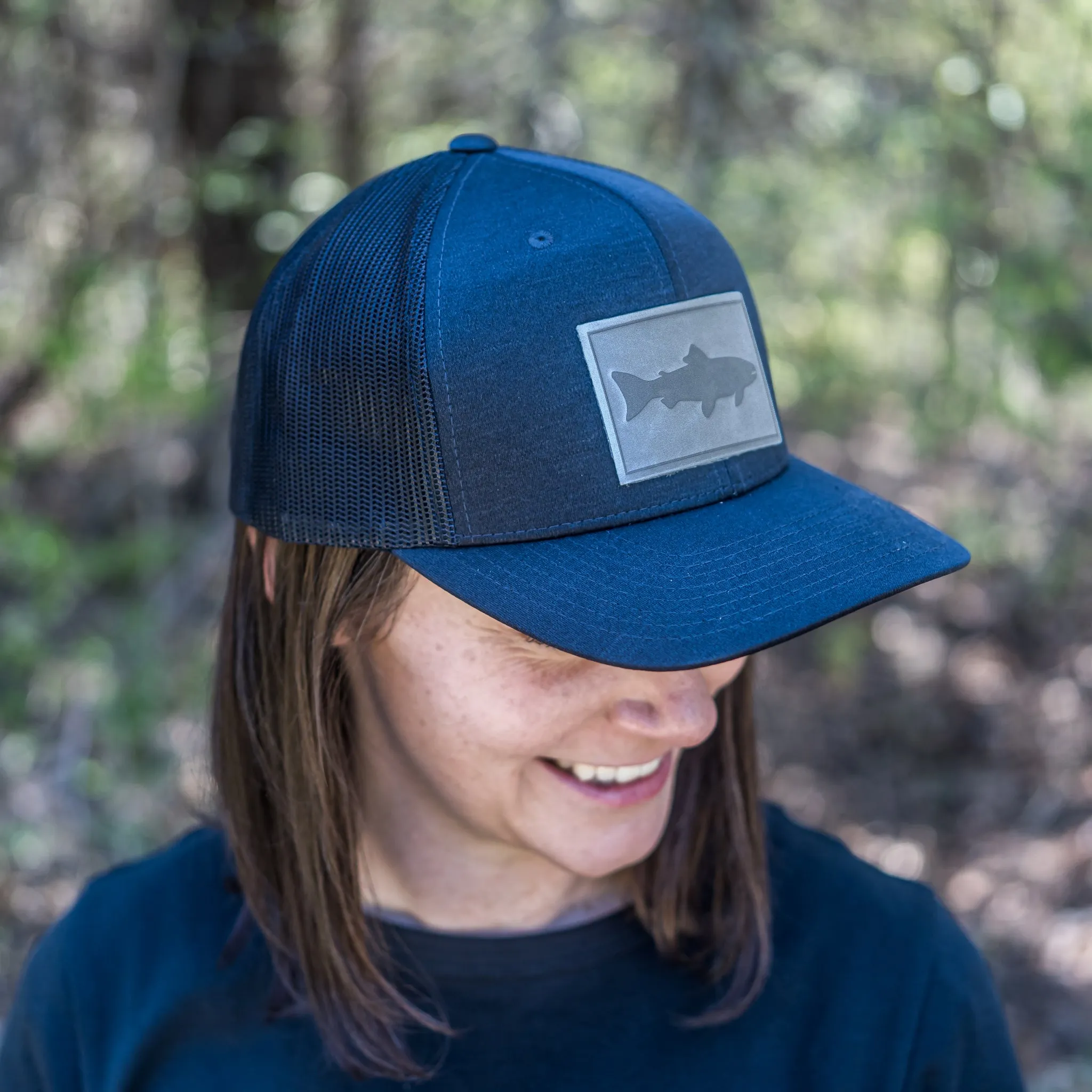 Leather Patch Performance Style Trucker Hat - Fish Stamp