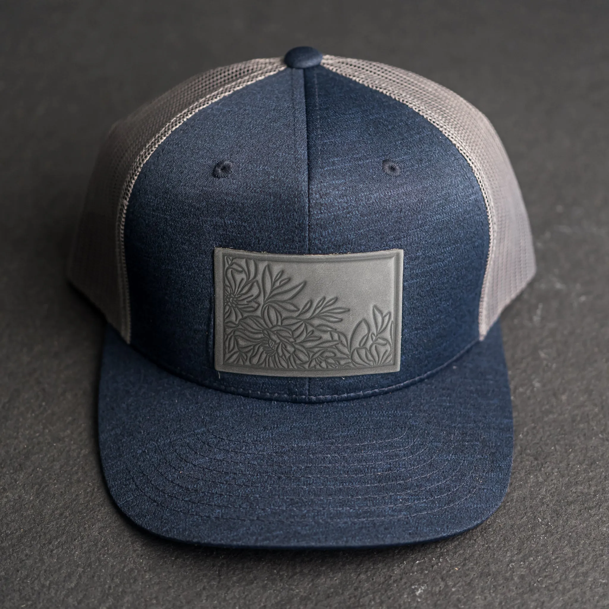 Leather Patch Performance Style Trucker Hat - Floral Stamp