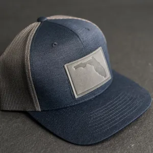 Leather Patch Performance Style Trucker Hat - Florida Stamp