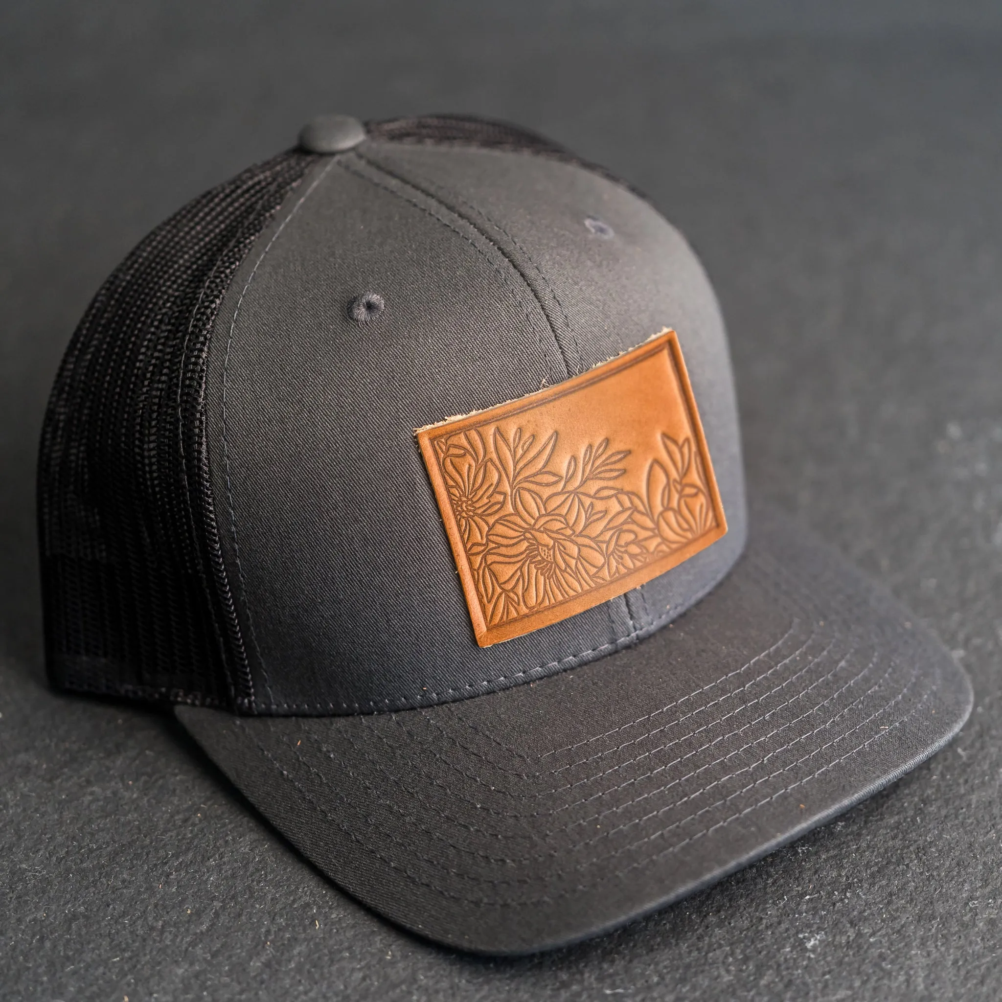 Leather Patch Trucker Style Hat - Floral Stamp