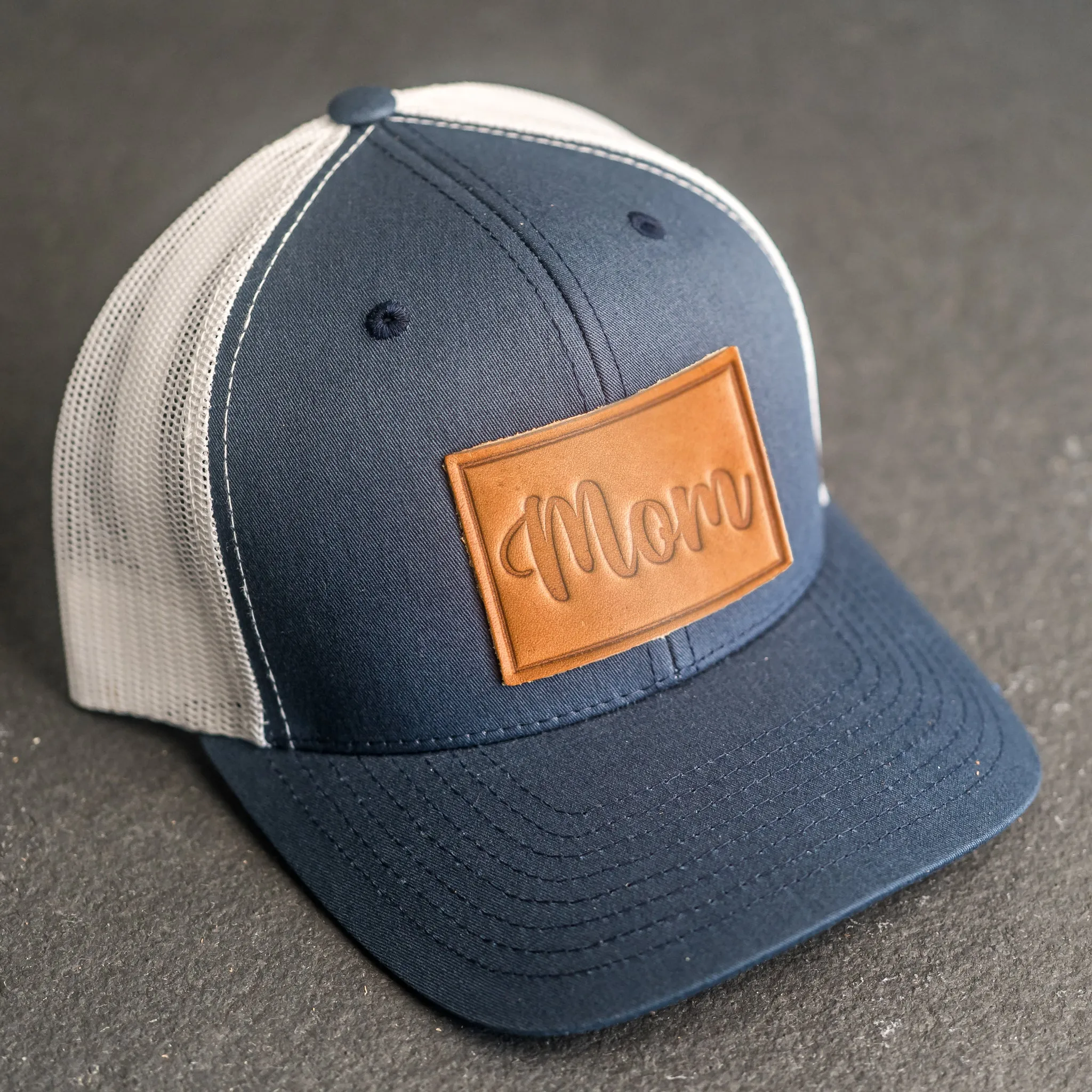 Leather Patch Trucker Style Hat - Mom Cursive Stamp