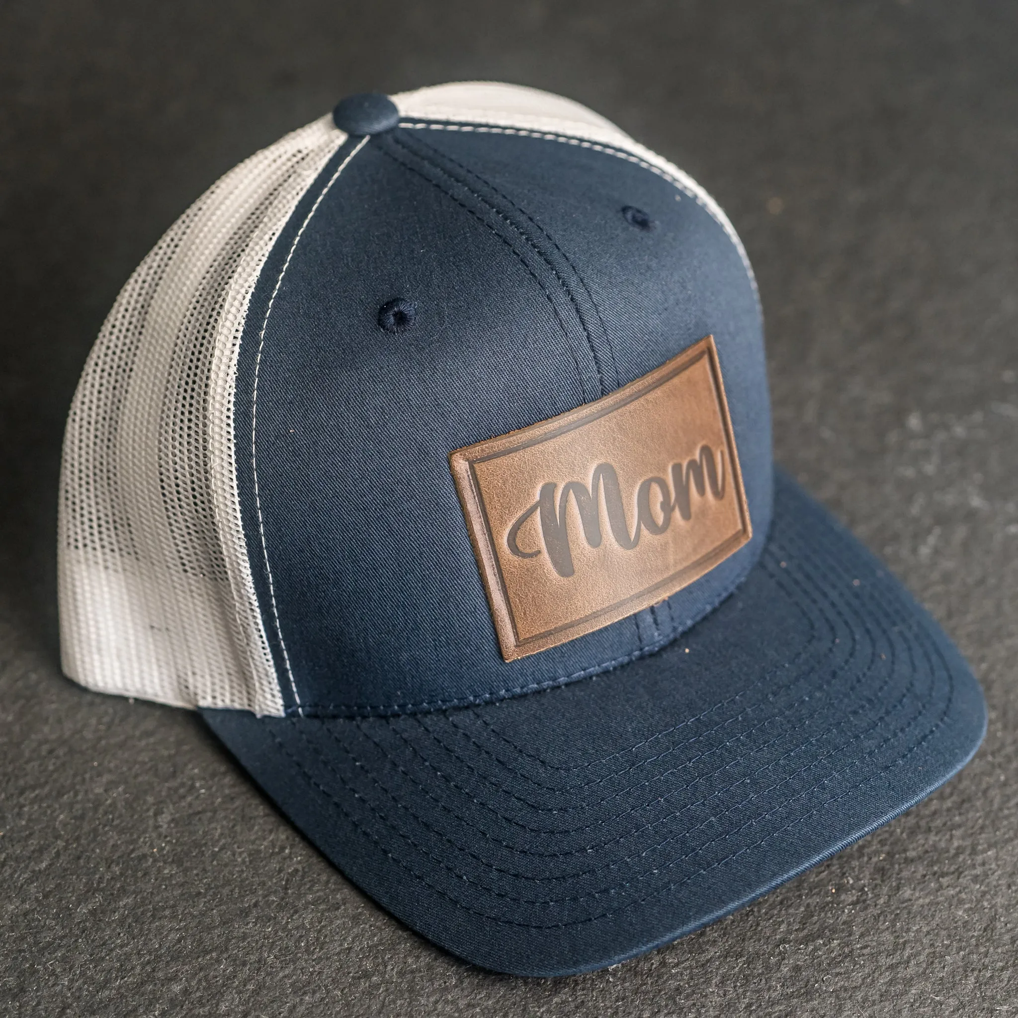 Leather Patch Trucker Style Hat - Mom Cursive Stamp