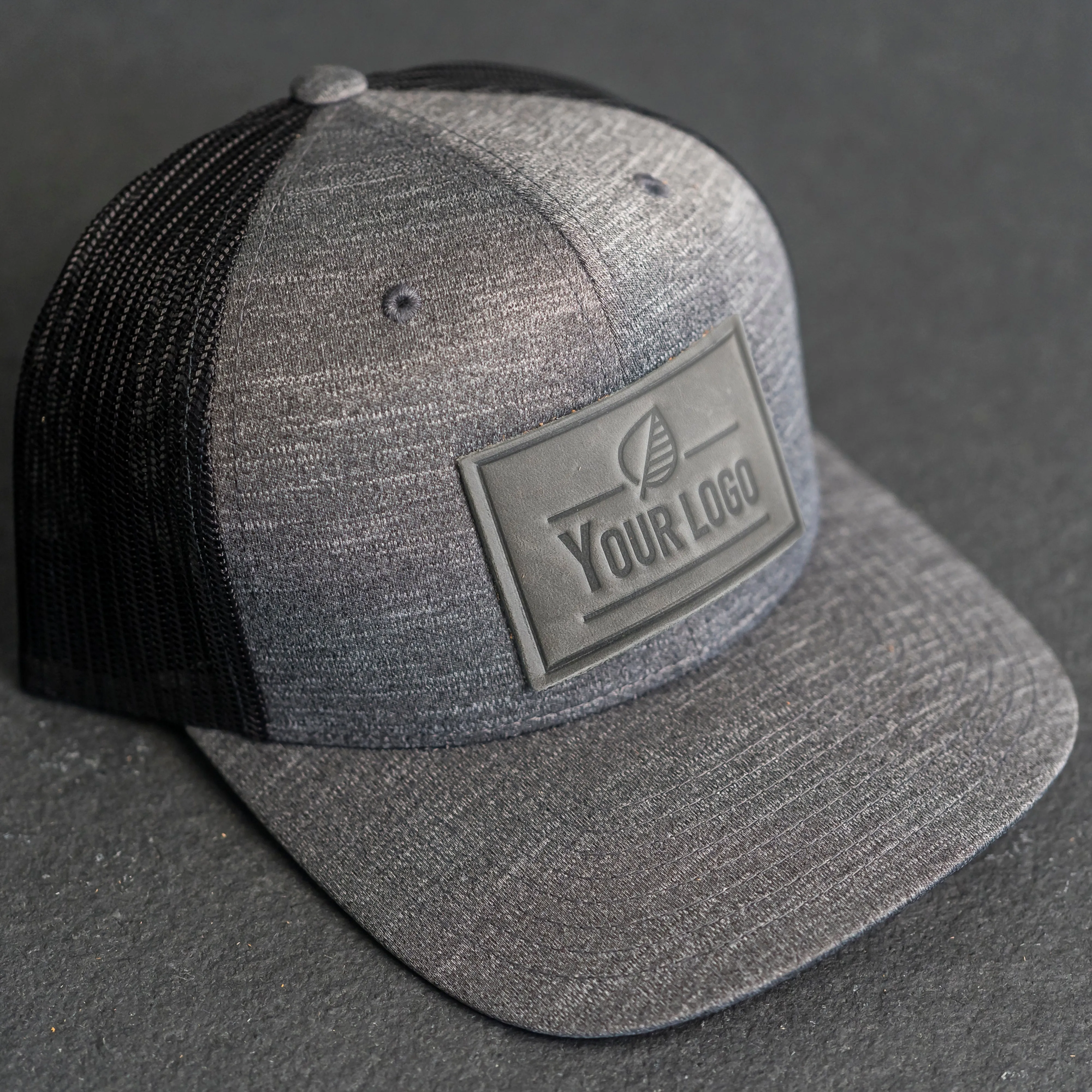 Your Logo on a Leather Patch Performance Style Trucker Hat